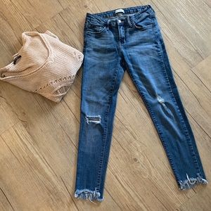 Light wash denim with rips